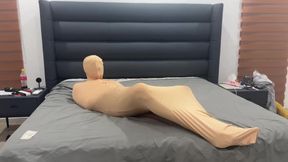 Encased in Nylon Cocoon for Ultimate Bondage Domination