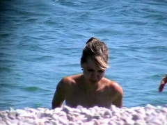 Naked Blonde Sunbathing On A Public Beach