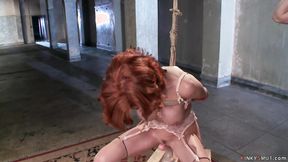 ”MILF trainee doing squats on dildo”