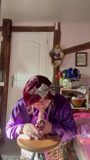 Dressed in a little leopard skirt to suck a dildo