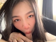 Asian Amateur Babe Gives a Knee-high Footjob