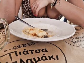 fingering in a restaurant full of people, showing vagina and titties