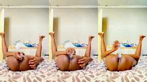 enjoying strokes with a dildo