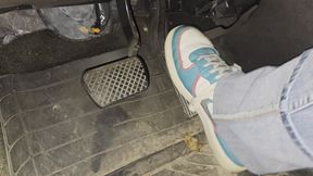 Driving from an event in Nike air