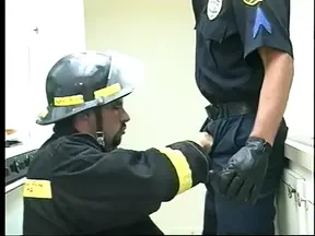 Fireman fucks gay police officer's ass then cums on his abs