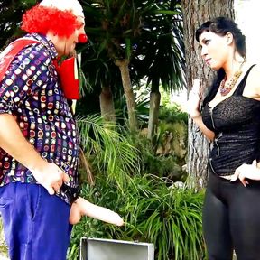 Super busty German chick with many tattoos pleasing a clowns hard cock