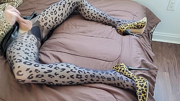 Shemale jerking off in leopard print pantyhose and heels