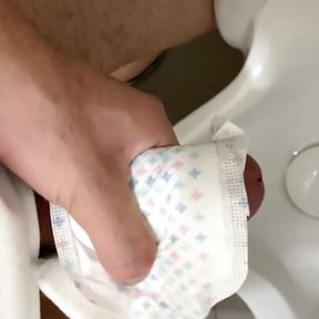 Cumming on the Sanitary pad in public toilet