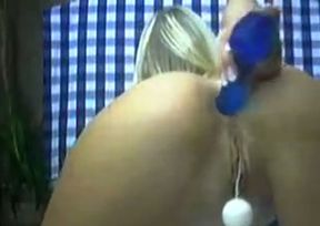 Luscious tanned blonde  spreads her buttocks and shows off welcoming ass hole