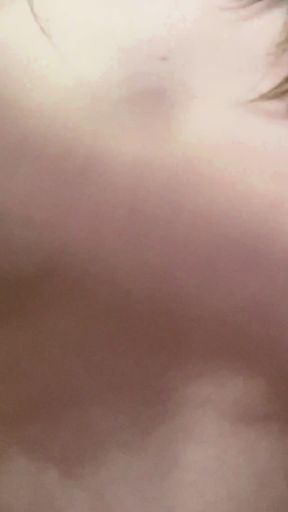 The Doll Shows Her Bare Breasts