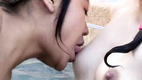 ”Lesbian hotties toying each other in the pool”