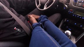 Amateur MILF in jeans and nylon socks gives a taxi driver a footjob
