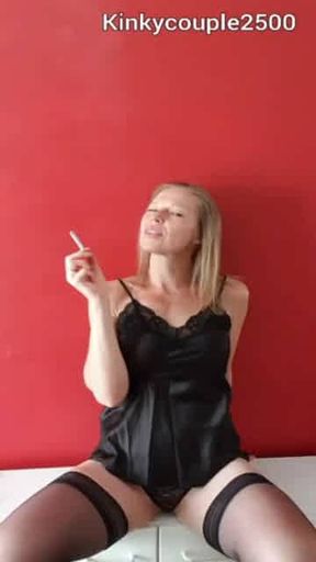 Belgium Slut is smoking and plays with her cunt