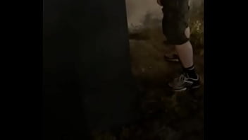 Helping him pee in the street