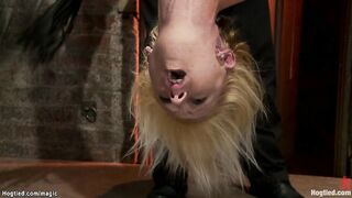 Blond in upside down suspension whipped