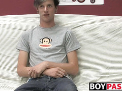 Adorable gay guy Danny jerks off his dick on couch solo