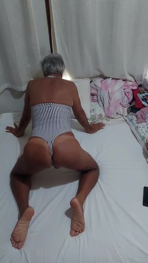 Ladysilva in Bed in Sexy Bodysuit Showing off Her Tanned Ass