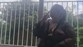 Mistress Smokes in the Sun in Sheer Robe