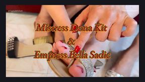 Empress Bella Sadic shows her new slippers to Mistress Dona Kit