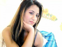 Sultry Indian teen with a cute smile plays with herself on the webcam