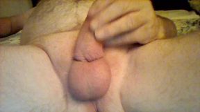 Lying and playing with my cock
