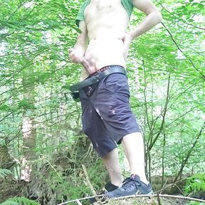 Hot and horny guy jerking off and cumming in the forest