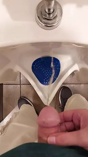 Taking a Piss at a Urinal