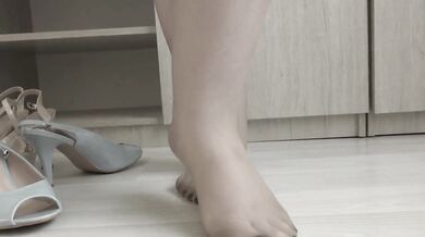 I put on nylon tights and try on high-heeled shoes.