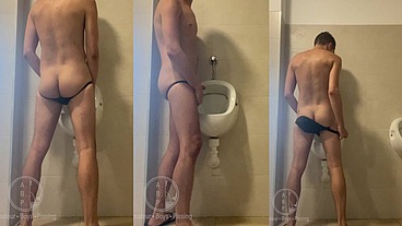 Dared his flatmate to expose his hot smooth butt at the pool's public toilets urinal