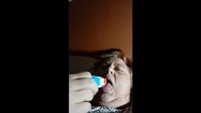 Red white and blue sucking a bullet pop for You ! wmv