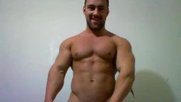 Big Muscled Bodybuilder Flex and Jerk a Bit