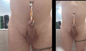 Inserting a toothbrush 14mm/14cm vertically into the penis with a penis in the shower