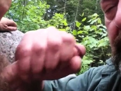 Older guy has fun sucking a younger guys cock in the park