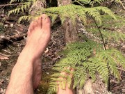 In the deep bush land where no one goes is a man playing with his extra long toes - MANLYFOOT