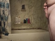 Fat guy jerks dick in shower and swallows own cum