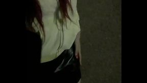 CD Janita walks outside @night