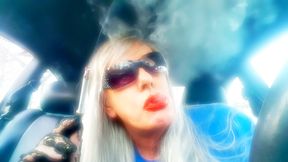 DOMMIE MOMMY SMOKING LONG CIGARETTES IN A HOLDER