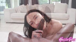 Tall inked busty babe Indica Marie shows off her big natural tits as she