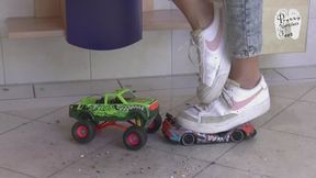 Christin crushes two Cars under her Sneakers