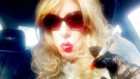 MRS. ROMAN SMOKING MARLBORO 100's IN HER CAR