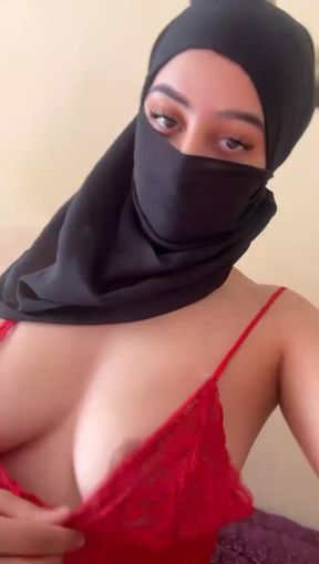 Hijabi solo tease with big juicy titties  Arab Muslim slut plays with her boobs