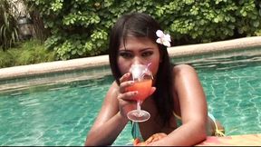 By the pool the beautiful Thai Kanda started stroking her big tits and her pussy