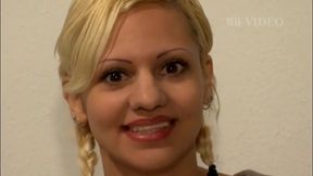 Blonde milf with her legs held 180 degrees to screw her pussy with the sex toy