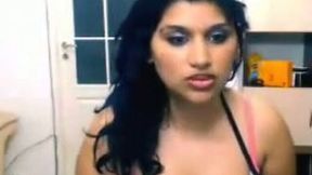 Chunky Indian beauty shows her tits and fingers her hairy cunt