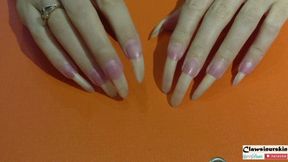 Tapping, scratching, polishing in dark red and admire my long claws and again tapping and scratching