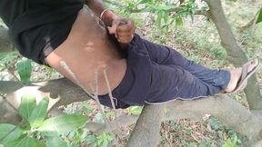 The boy from the local village goes to the garden and climbs on the ground and punches him
