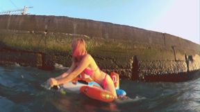 Alla is riding hotly on a rare inflatable plane on the waves!!!
