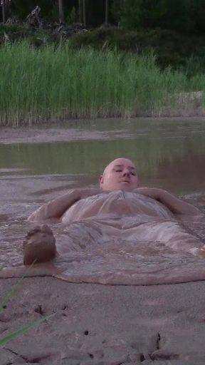 Mud Bath in Deep Quarry Mud Pond