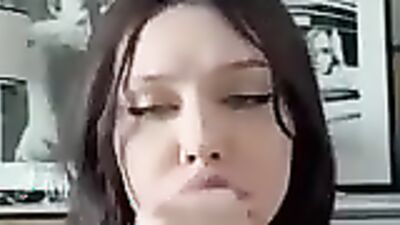 Cheating Brunette gets her huge tits covered in cum after getting eye contact with her man