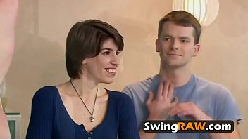 Amateur swinger couple is having a hot full swap in the shower.